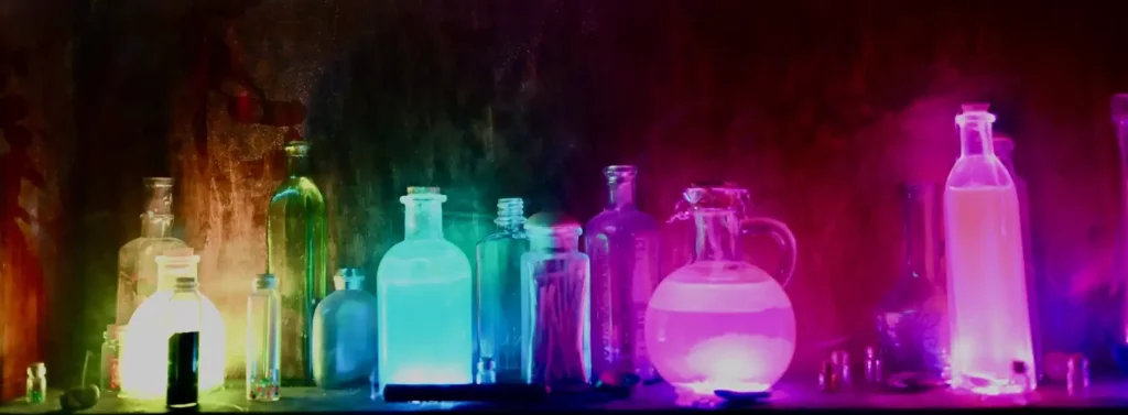 Illuminated potions on a shelf