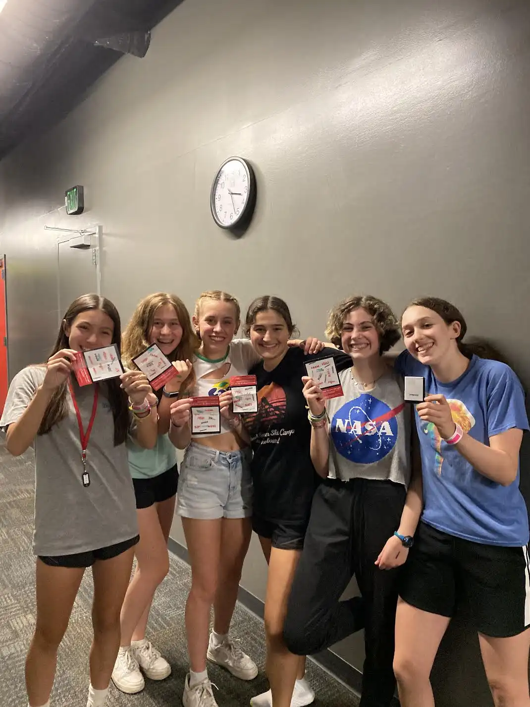 Kids holding stamp cards